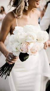 Here are some of the prettiest peony bouquets, from bold and bright bridal flowers to subtle bridesmaid bouquets. The Prettiest Wedding Bouquets 2020 In 2020 White Rose Wedding Bouquet Modern Wedding Bouquets Pretty Wedding Bouquet