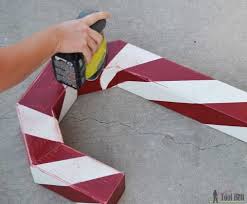 Unique balancing design fits nearly any mantel and doesn interfere with other decor on top. Candy Cane Holiday Stocking Post Her Tool Belt