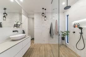 Black And White Marble Tiles Bathroom Contemporary Style Bathroom Example With Large Marble Slabs Wood Floors And Black Accents Marble Contemporary Style Bathrooms Bathroom Styling Bathroom Decor