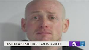 Suspect arrested in Roland standoff