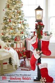 No Mantel No Problem Diy Stocking Holder Faux Gas Lantern Diyworkshop Sponsored St Christmas Decorations Diy Stocking Holder Christmas Stocking Holders