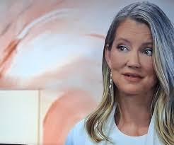 Why was Anna revealing top secret information about the WSB to a patient  advocate from the hospital?