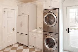 dryer alongside stacked washer dryer