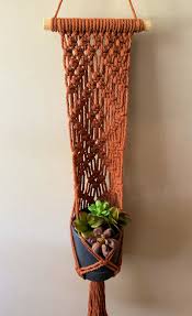 I did not take photos while making this piece, but here is a link for step by step instructions and i made a quick video that i think will be helpful to watch and hopefully easy to follow. Macrame Plant Hanger Diy Wall Hanging Tutorial Video Marching North