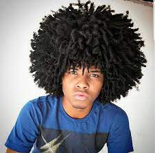 Long front fringe afro look hairstyle is highly admired by black men and is a fashionable style. Male Afro Styles Novocom Top