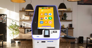 The machine is green and located between the front door and the side door, right across from the ice cream counter General Bytes Bitcoin And Cryptocurrency Atms