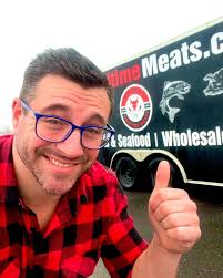What are the hours, dates, and selection of the seafood truck from PEI in  Cheesy Royale parking lot?