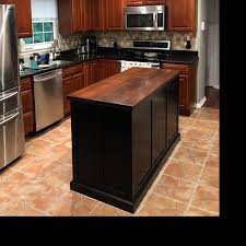 Kitchen Island With Seating And Tapered Legs In 2020 Kitchen Island With Seating Custom Kitchen Island Kitchen Island Cabinets