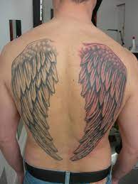 Penting Beckham Nuque Tatouage Ailes D Ange Paling Update
