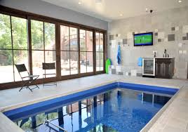 Swimming is an excellent cardiovascular exercise for. Indoor Pool And Hot Tub Ideas Swim With Style At Home Luxury Home Remodeling Sebring Design Build
