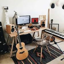 Whether you have an extra bedroom or a flex space, you can create a stylish and useful home music room for practicing, recording, or even entertaining guests. Setting Up An Ideal Guitar Practice Space Guitar Gear Finder Music Room Decor Music Bedroom Home Music Rooms