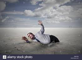 man sinking in quicksand high