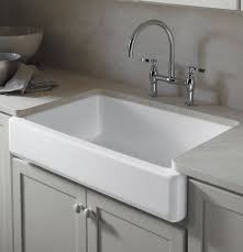 Torn between a stainless steel farmhouse style kitchen sink and a classic white one? Kohler K 6488 96 Whitehaven Farmhouse Self Trimming Apron Front Single Basin Kitchen Sink With Short Apron Biscuit Farmhouse Goals