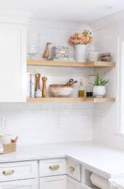 Shelf organizers, risers and cabinet drawers make your spices, kitchen tools and dinnerware easily visible and accessible. My Kitchen Remodel Reveal White Kitchen Remodeling Kitchen Remodeling Projects Open Kitchen Shelves