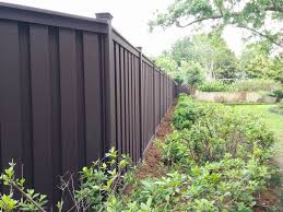 Maybe you would like to learn more about one of these? Dark Brown Composite Fence Material Creates A Natural Backdrop For Wooded Properties Outdoor Wood Dark Brown Fence Hardscape