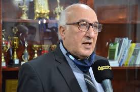 The Iraqi University Channel is conducting a television interview with the  Dean of the College of Medicine