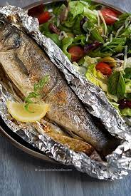 Lemon Stuffed Mediterranean Sea Bass Branzino Cooked In Foil Spicie Foodie Healthy Fish Recipes Recipe Fish Recipes Healthy Whole Fish Recipes Sea Bass Recipes