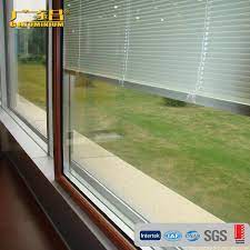 Double sliding door with grey blackout shades with cassette track and side rails by elite decor window treatments miami. China Aluminum Frame Double Glass With Blinds Inside Sliding Door China Aluminum Casement Doors Rolling Shutter Doors
