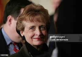 Father Dan Dunham wipes away a tear as mother Debra Dunham holds the...  News Photo