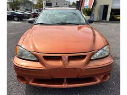 Image result for Sunburst Orange 2004 Pontiac