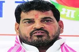 Samajwadi Party MP from Kaiserganj Brij Bhushan Sharan Singh sat on a dharna outside the office of the superintendent of police in Bahraich against the ... - M_Id_320483_mp