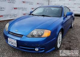 Image result for Sunny Yellow 2004 Tiburon