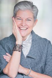 ABOUT — KAREN ROBERT