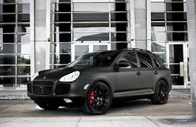 Customized Porsche Cayenne Turbo S With Full Matte Black Exterior Wrap Smoked Lights Painted Black Exterior Trim Lower Porsche Suv Cayenne Turbo Porsche Gts