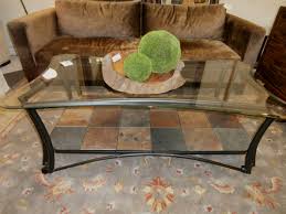 It measures 47.25 l x 21 w and is 15.25 tall, capable of supporting up to 100 pounds in weight. Stone Glass Metal Coffee Table At The Missing Piece