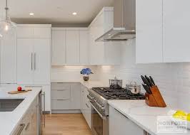 The Kitchen In This Modern Boston Condo Was Designed By David From Our Braintree Showroom In Collabora White Contemporary Kitchen Contemporary Kitchen Kitchen