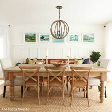 Dining room paintings a finely set dining room table with china and crystal creates the mood for an elegant dining experience with friends, family, or business associates. Painting Simply White In The Dining Room Kitchen The Happy Housie