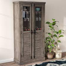 The larson collection liquor and wine cabinets bring with them an industrial style that is also convenient in its usage as a furniture piece within the living room or the. Laurel Foundry Modern Farmhouse Matecumbe Bar Cabinet Reviews Wayfair