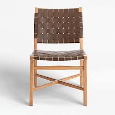 These barrel dining chairs are available in various distinct colors and shapes to choose from and can also be customized. Taj Brown Woven Leather Dining Chair Reviews Crate And Barrel
