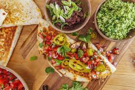 Rachael S Ground Beef Stuffed Quesadillas And Refried Black Bean Rachael Ray Beef Recipes Beef Dinner Favorite Casseroles