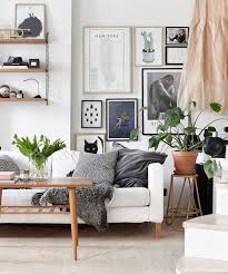 How Gallery Walls Are Like Cats And Why Your Home Probably Needs One Living Room Scandinavian House Interior Room Inspiration