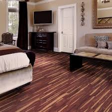 Trafficmaster African Wood Dark 6 In W X 36 In L Luxury Vinyl Plank Flooring 24 Sq Ft Case 57111 0 The Home Depot Luxury Vinyl Plank Flooring Luxury Vinyl Plank Vinyl Plank Flooring