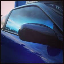 Black car with tinted windows. Blue To Black Fader Window Film Tinted Windows Car Window Repair Window Repair