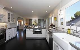 Therefore, though out of fashion for a while now, wood finishes are slowly reviving in modern kitchen designs. Pin By Patti Vidimos On For The Home White Kitchen Remodeling White Modern Kitchen White Kitchen Dark Floors