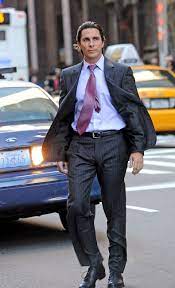 If there ever were a fictional character that deserved a killer wardrobe, it would be bruce wayne, the billionaire playboy who is secretly saving the world as batman. Bruce Wayne Prefers Two Button Armani Suits In The Dark Knight Rises Vanity Fair