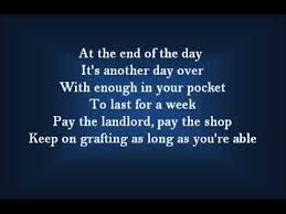 An irritating verbal crutch, indicating closure or synopsis, for morons who are incapable of finishing a sentence without incorporating at least one tired cliche. At The End Of The Day Lyrics 25th Anniversary Concert Youtube