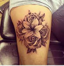 Lily And Rose Tattoo Lily Tattoo Sleeve Lily Tattoo Design Rose Tattoos