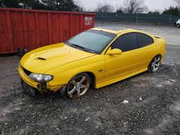 Image result for Yellow 2004 Pontiac