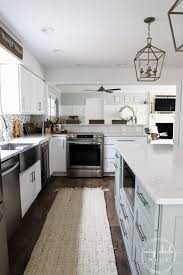 Among popular beachy things that can relate to this backsplash include blue selection, wooden color, and beachy decoration. Diy Coastal Kitchen Makeover Reveal Full Remodel Artsy Chicks Rule