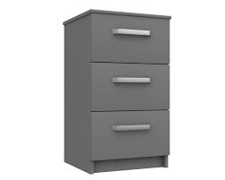 A grey bedside table with three small drawers. Arden Dust Grey High Gloss 3 Drawer Bedside