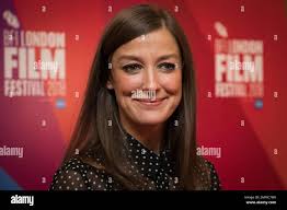 Alex Maria Lara poses for photographers upon arrival at the screening of  the film 'Happy New Year, Colin Burstead' showing as part of the BFI London  Film Festival in London, Thursday, Oct.