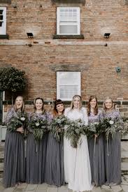 Bridesmaids In Charcoal Grey For A Foliage Filled Winter Wedding At The West Mill Derby Pretty Bridesmaid Dresses Floaty Bridesmaid Dresses Charcoal Grey Bridesmaid Dresses