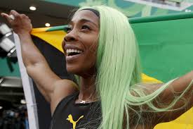 She's the one with yellow hair. Jamaica Fraser Pryce Breaks 40 Year Old Pan Am Games Record