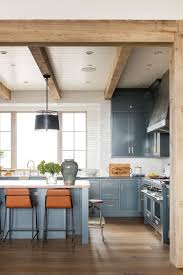 7 Farmhouse Kitchen Cabinets That Are Here To Charm In 2020 Lake House Kitchen Rustic Kitchen Ranch House