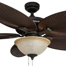 Chose tropical outdoor ceiling fans to accentuate seating areas Honeywell Palm Island 52 Inch Tropical Ceiling Fan With Sunset Glass Bowl Light Five Palm Leaf Blades Indoor Outdoor Bronze Pricepulse