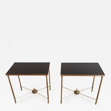 This kind of element is a high quality end table that features and interesting antique style with a brass construction. Mid Century Pair Of Brass End Tables With Black Opaline Glass